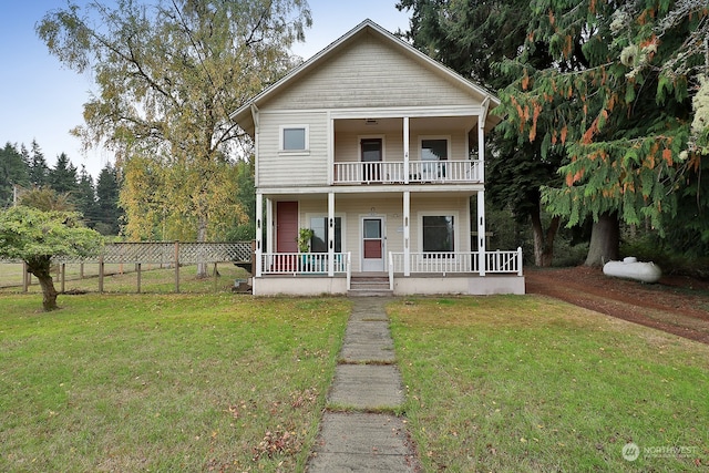 view of front facade featuring a porch and a front yard