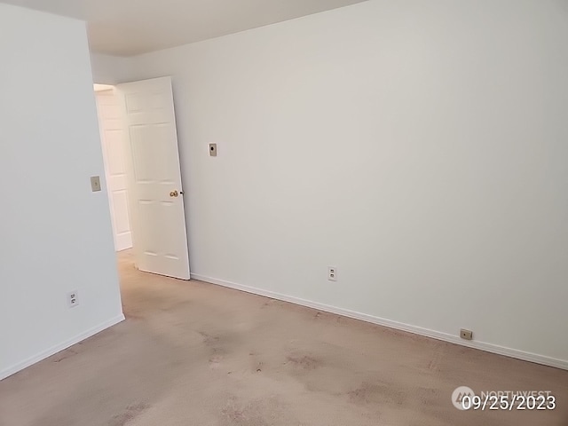 view of carpeted spare room