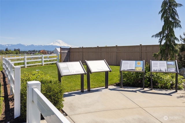 view of patio / terrace with a mountain view