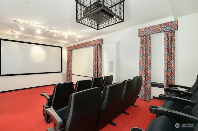 cinema with carpet floors and track lighting