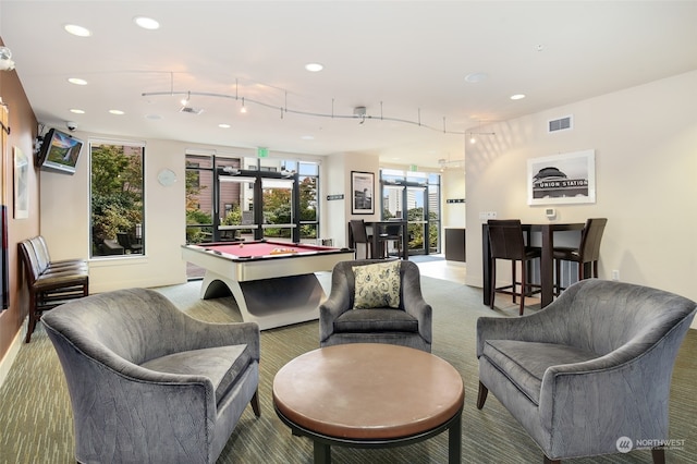 interior space featuring french doors, rail lighting, and billiards