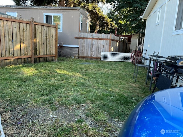 view of yard featuring a fenced backyard