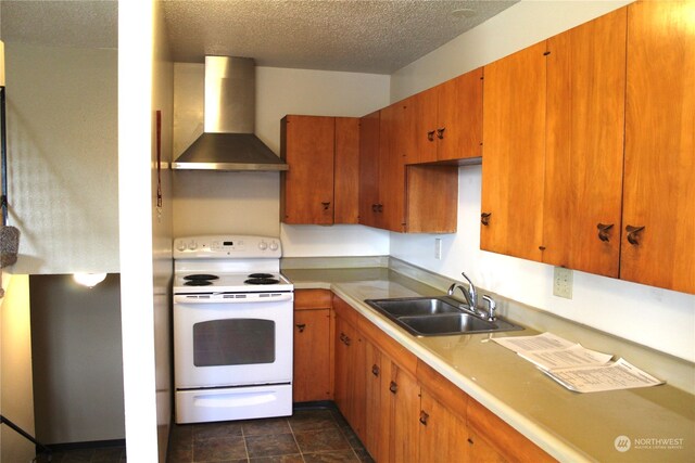 kitchen featuring white electric range, a textured ceiling, wall chimney exhaust hood, sink, and dark tile floors