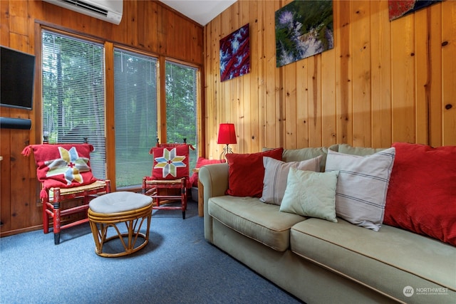living room with a wealth of natural light, wood walls, and carpet