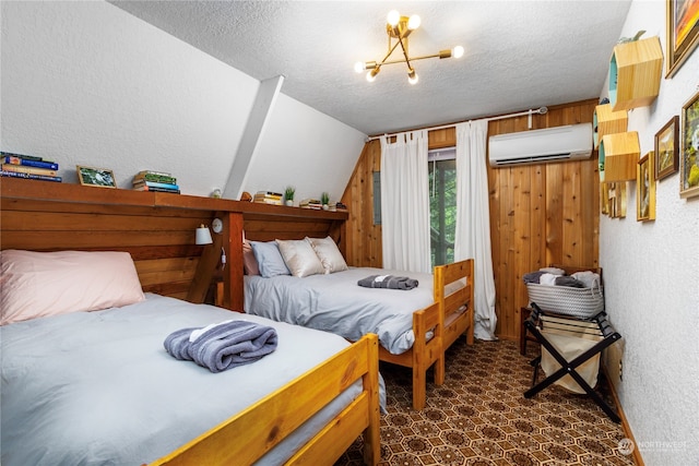 carpeted bedroom with vaulted ceiling, a textured ceiling, an inviting chandelier, and a wall mounted air conditioner