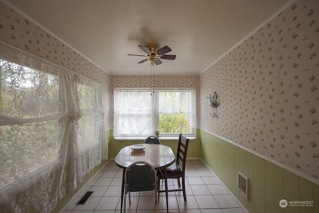 sunroom / solarium with ceiling fan