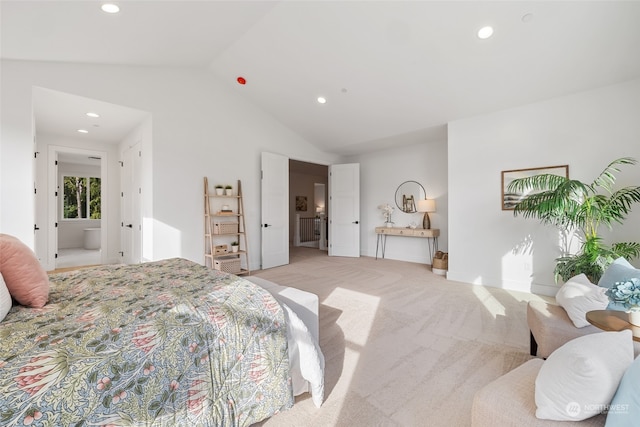 carpeted bedroom featuring vaulted ceiling