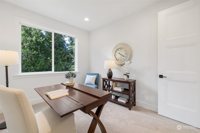 dining room featuring light carpet, recessed lighting, and baseboards