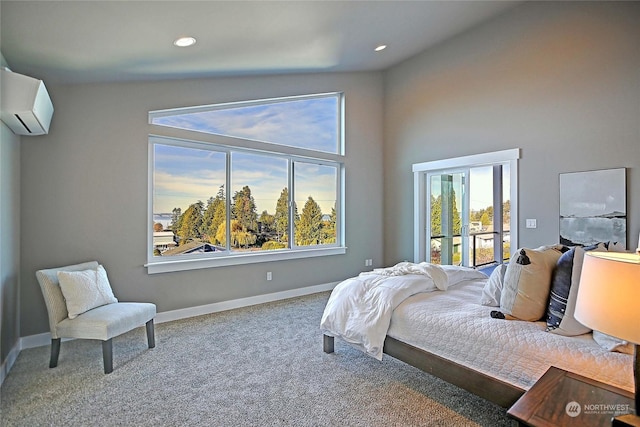 carpeted bedroom with multiple windows, lofted ceiling, and a wall mounted air conditioner