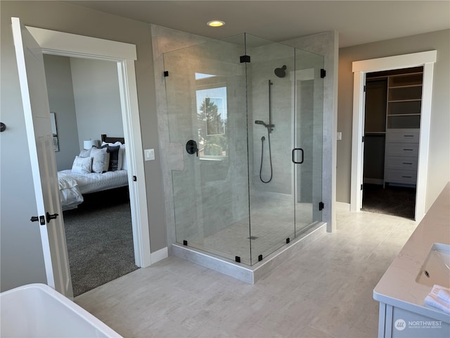 bathroom featuring vanity and walk in shower