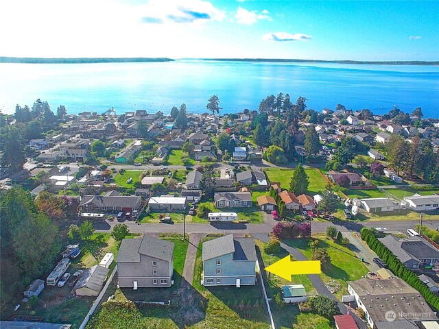 drone / aerial view featuring a water view