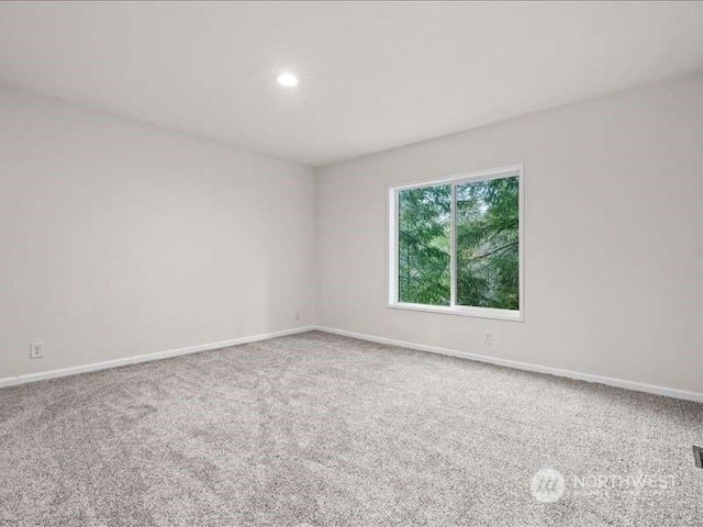 670 E Wilson Way, Grapeview, WA 98546 - carpeted spare room featuring baseboards and recessed lighting
