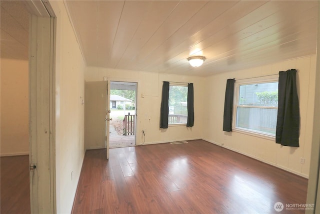 14040 Ashworth Ave N, Seattle, WA 98133 - spare room with dark wood finished floors and wooden ceiling