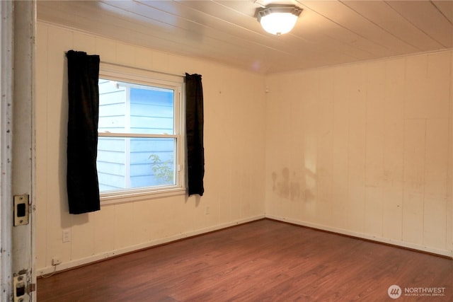 14040 Ashworth Ave N, Seattle, WA 98133 - spare room featuring wood finished floors and healthy amount of natural light