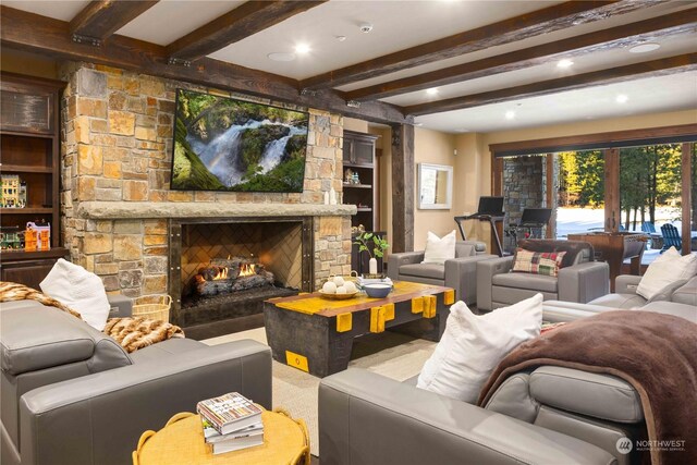 living room featuring a fireplace and beamed ceiling