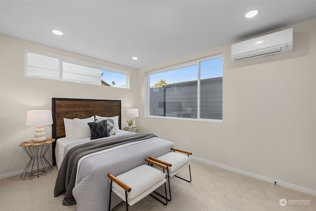 bedroom featuring light colored carpet and a wall unit AC