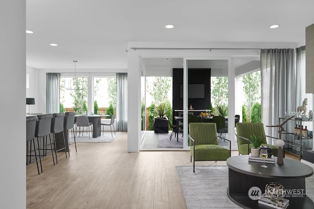 interior space featuring wood finished floors and recessed lighting