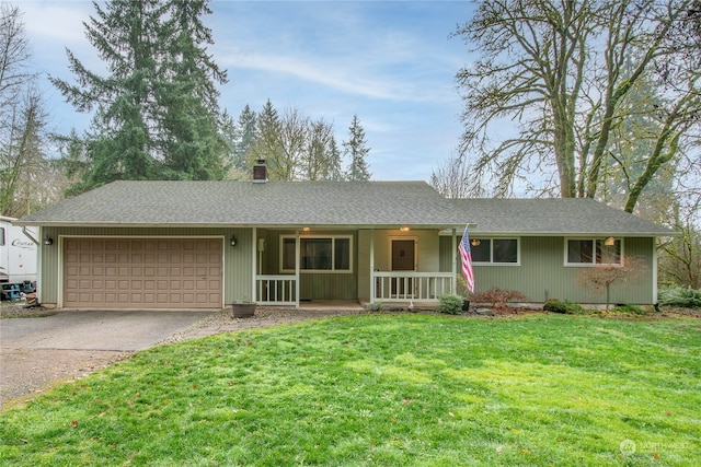 ranch-style home with a porch, a garage, and a front lawn