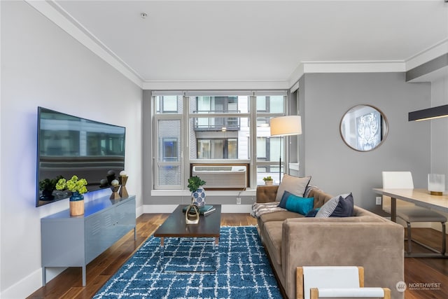 living room with ornamental molding and dark hardwood / wood-style floors