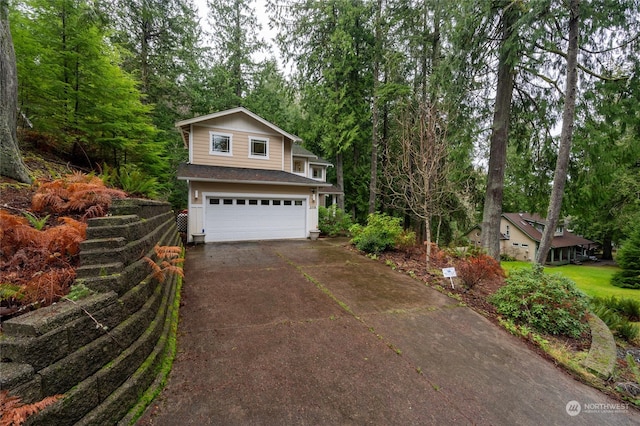 view of front property with a garage