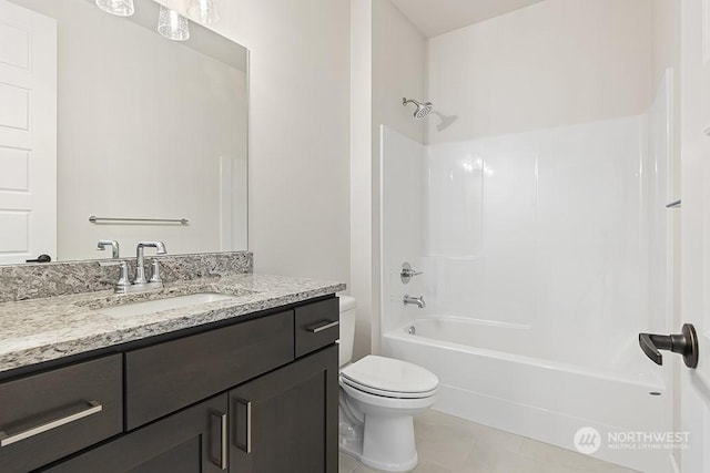 full bathroom featuring tile patterned flooring, vanity, toilet, and shower / bathtub combination