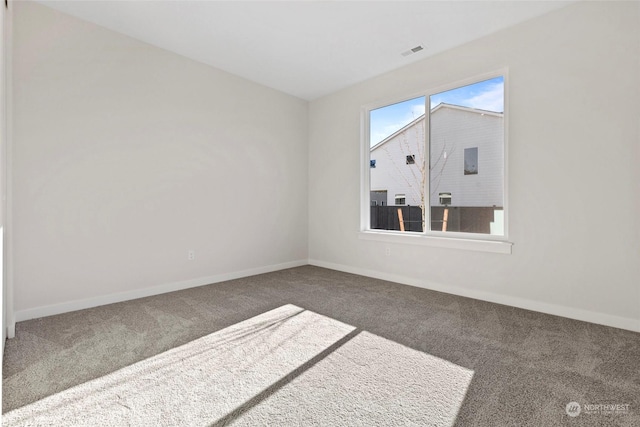 unfurnished room with carpet