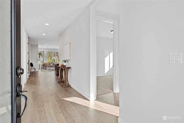 hallway featuring light hardwood / wood-style floors