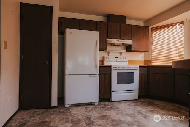 kitchen featuring white appliances, dark tile floors, and dark brown cabinets