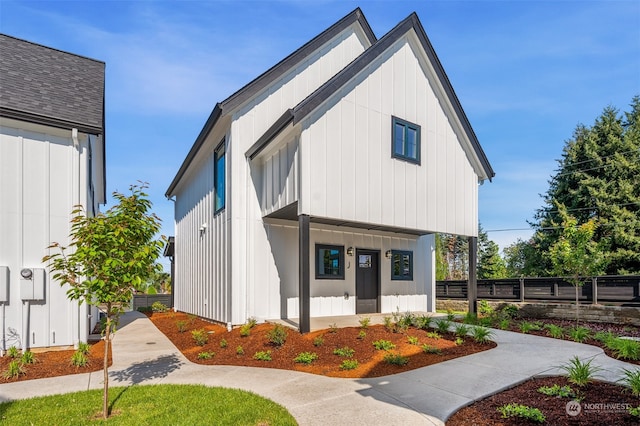 modern farmhouse style home with covered porch