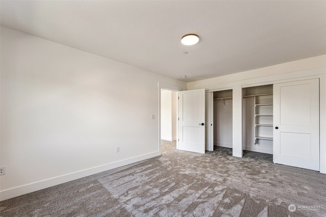 unfurnished bedroom with carpet floors