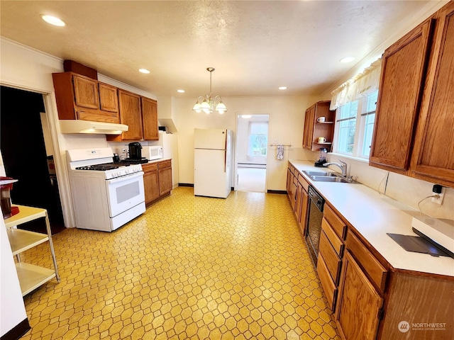 kitchen with pendant lighting, white appliances, an inviting chandelier, and sink