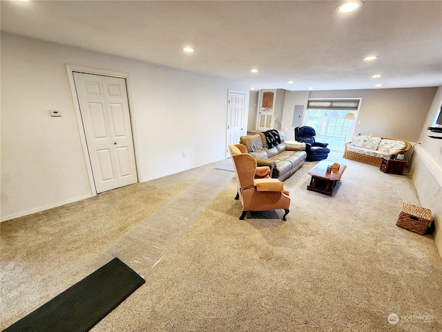 living room featuring light colored carpet