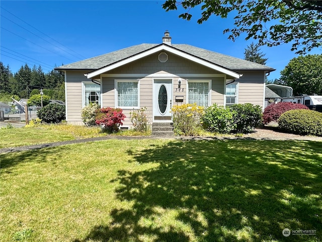 view of front of home with a front yard