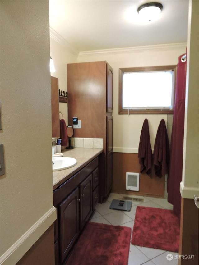 1402 Adams Rd N, Quincy, WA 98848 - bathroom with tile patterned floors, vanity, baseboards, and ornamental molding