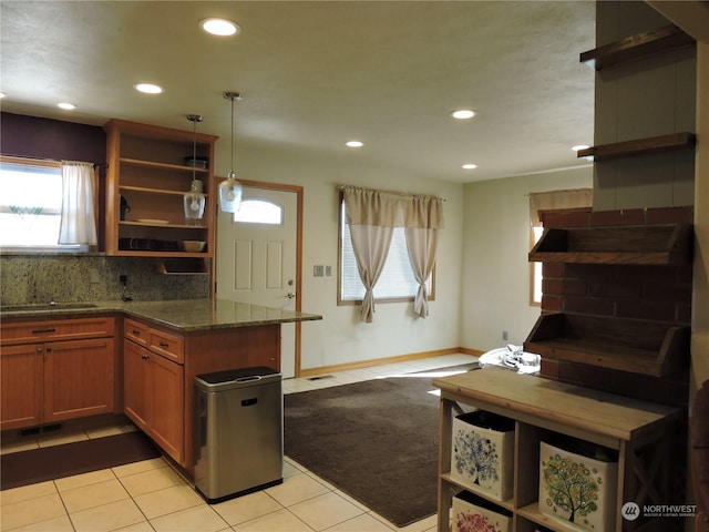 1402 Adams Rd N, Quincy, WA 98848 - kitchen featuring dark stone countertops, decorative backsplash, open shelves, and recessed lighting