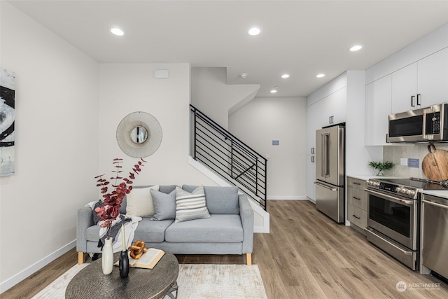 living room featuring light wood-type flooring