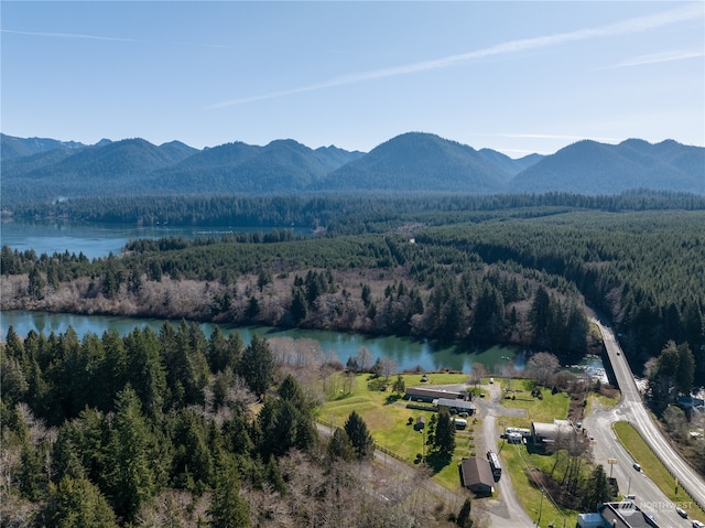 bird's eye view with a water and mountain view