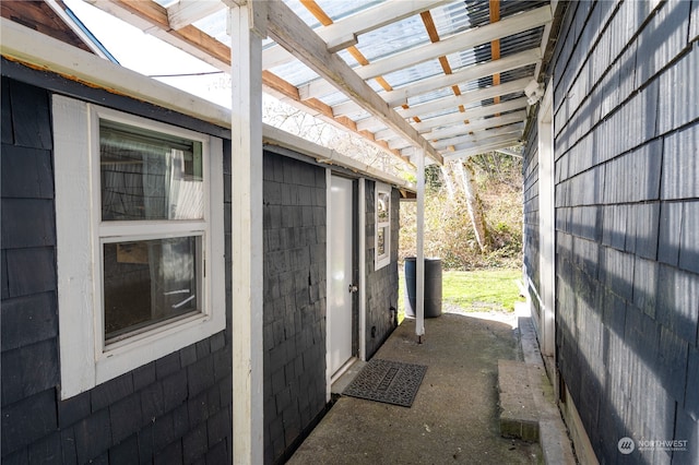 view of home's exterior featuring a pergola