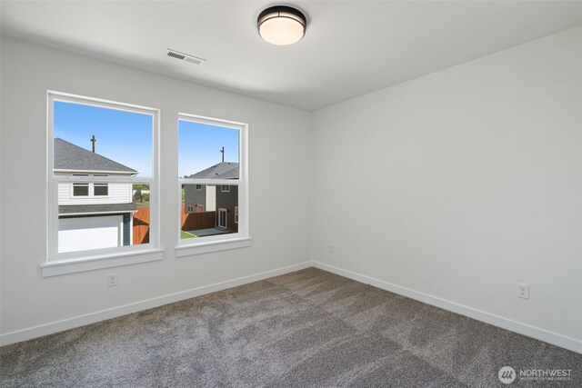 11114 NE 91st Ave, Vancouver, WA 98662 - spare room with baseboards, visible vents, and plenty of natural light