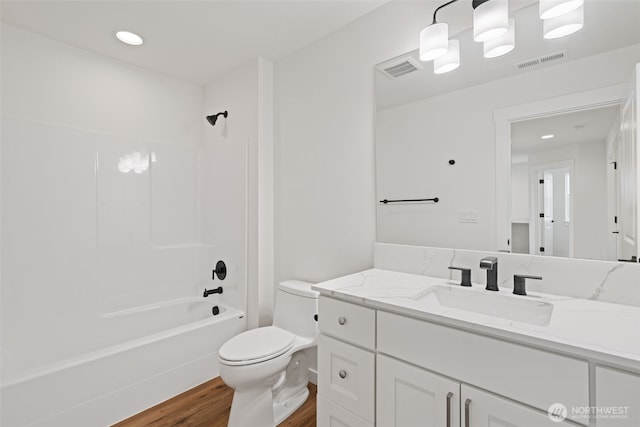11114 NE 91st Ave, Vancouver, WA 98662 - full bathroom featuring visible vents, wood finished floors, toilet, and shower / bath combination