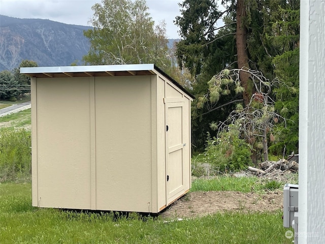 view of outdoor structure with a mountain view