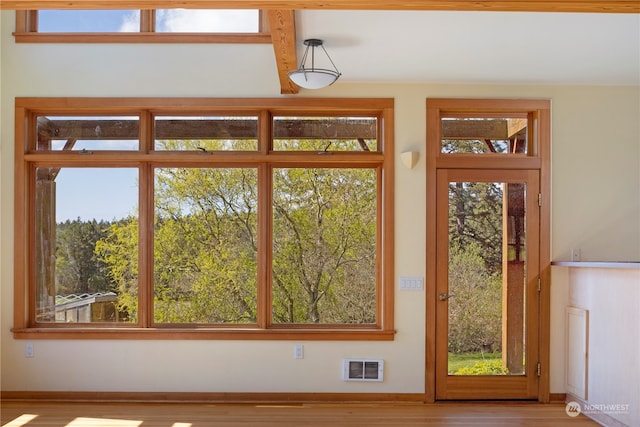 doorway to outside with light hardwood / wood-style flooring