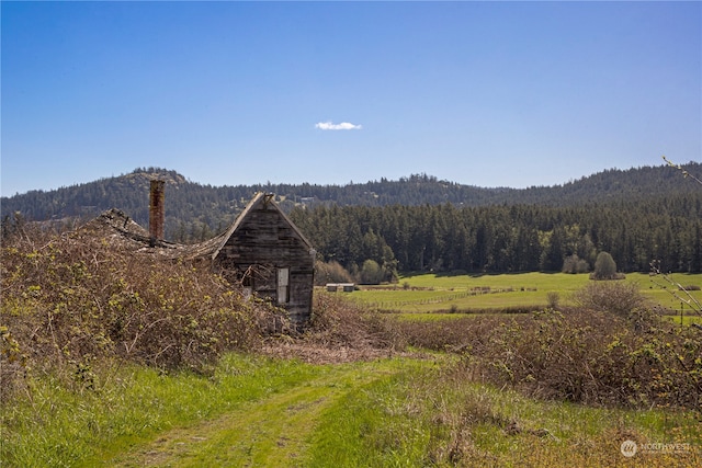 view of mountain feature featuring a rural view