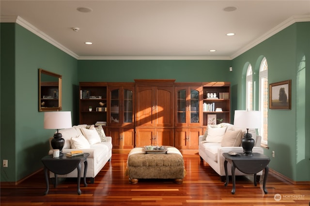 living room featuring crown molding and dark hardwood / wood-style floors