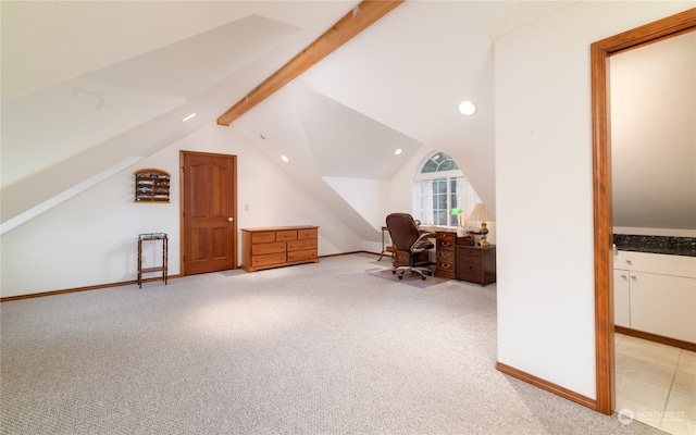 bonus room with light carpet and lofted ceiling with beams