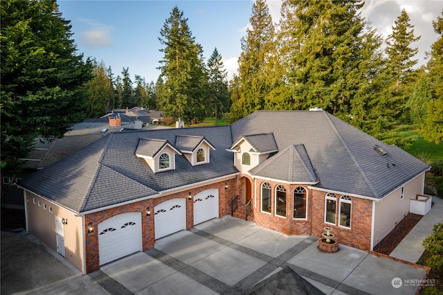 view of front of home with a garage