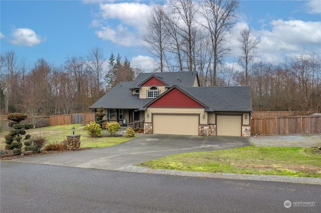 view of front facade with a front lawn and a garage