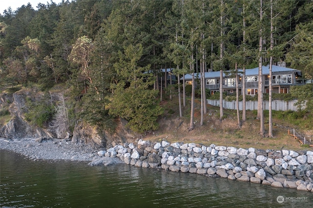 birds eye view of property featuring a water view