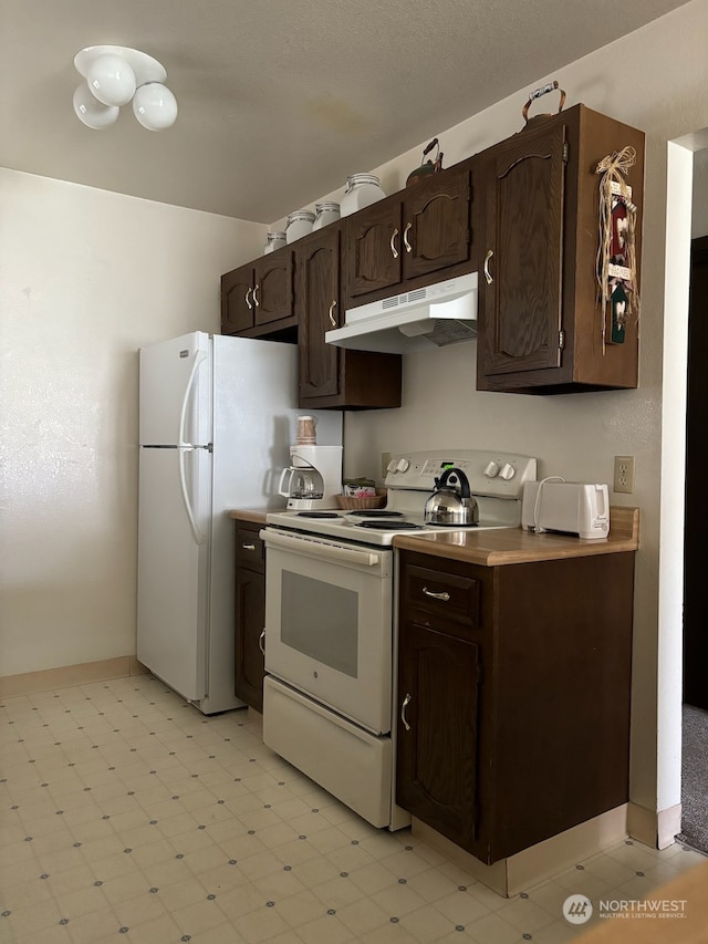 kitchen featuring dark brown cabinetry, white range with electric stovetop, and light tile floors