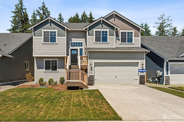 view of front facade with a front lawn and a garage